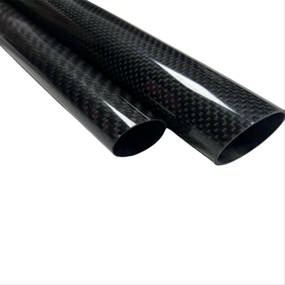 Carbon fiber threaded tube with helical ribbing